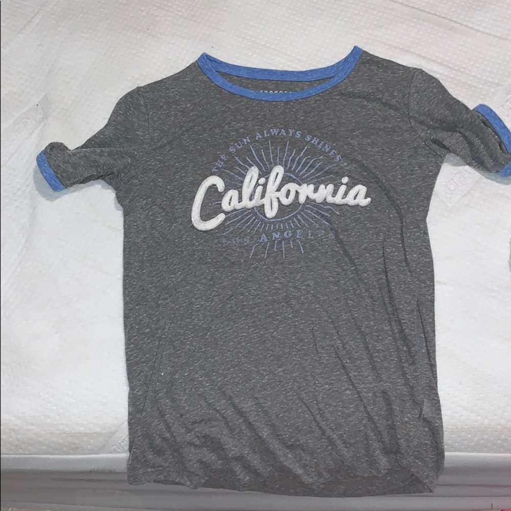 Grey, blue Aeropostale shirt.